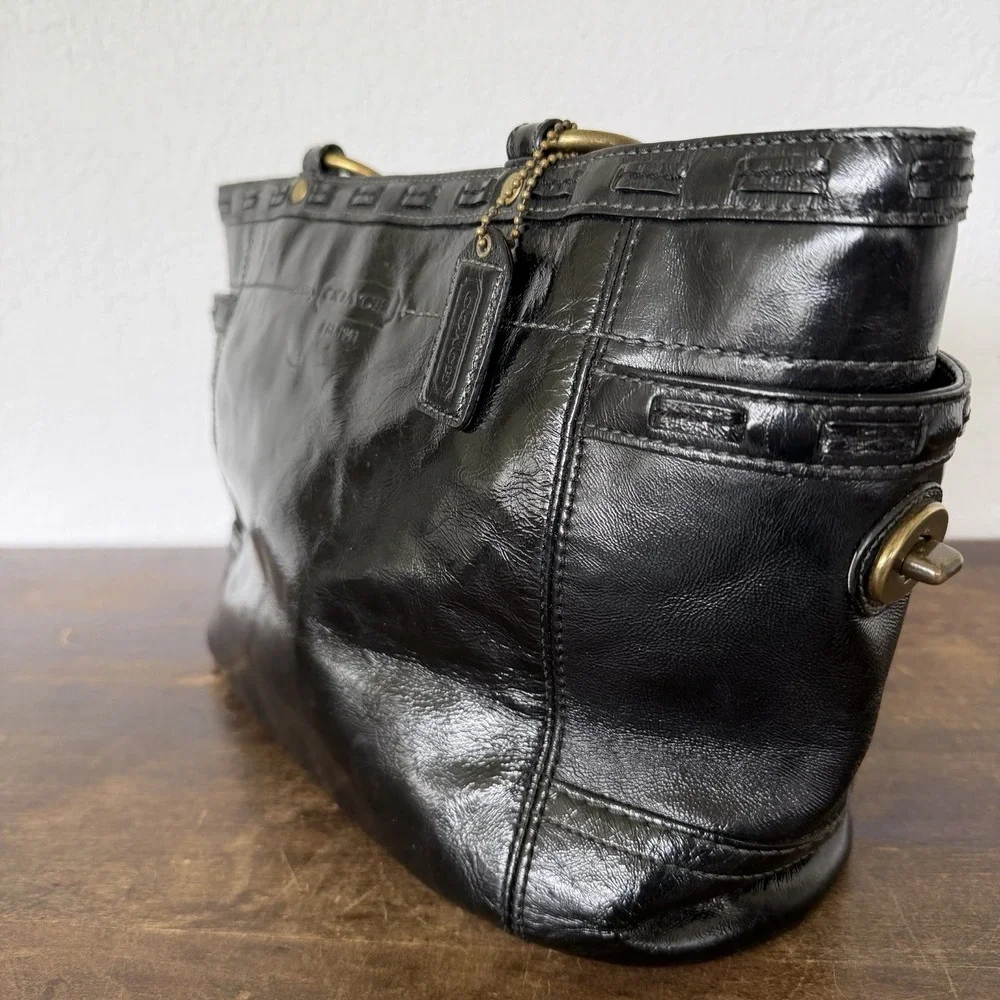 Coach Gallery Laced East West tote bag in black patent Leather Brass Hardware.